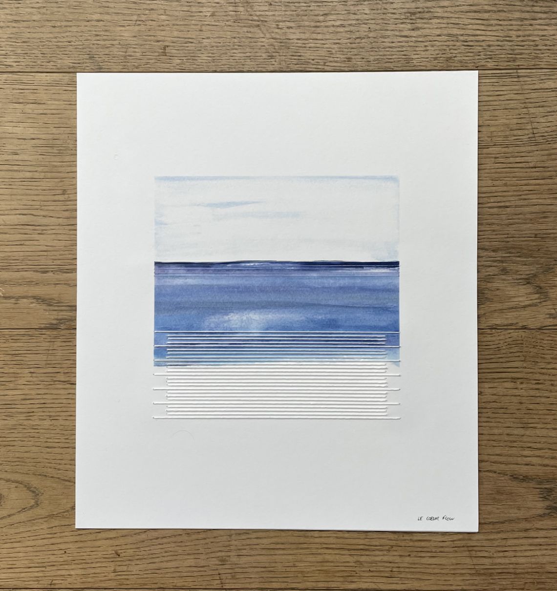 Broderie sur papier avec fil de coton blanc et fil argenté.